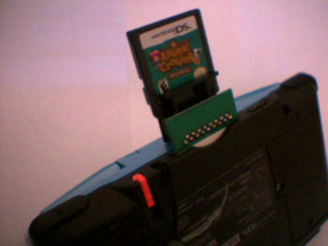 The PassMe inserted into the DS card slot